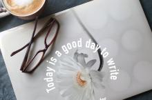 computer with glasses and a coffee